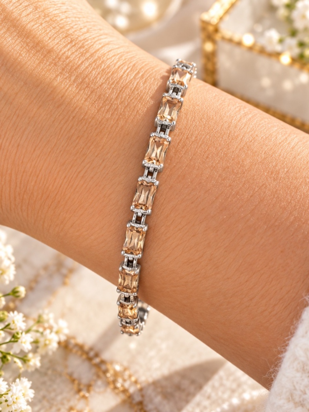 Silver bracelet with champagne colored gemstones